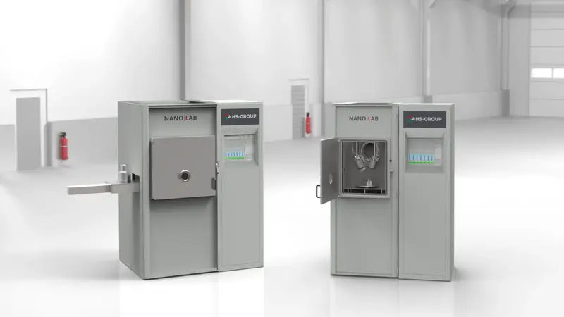 Dieses Bild zeigt die kompakte und vielseitig einsetzbare Nanolab Vakuumanlage. Mit einstellbaren Magnetrons und Ionenquelle, geeignet für F&E Zwecke. 